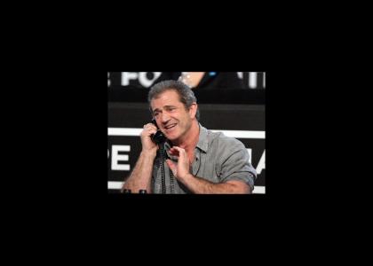 Mel Gibson talks on the phone Mel Gibson talks on the phone