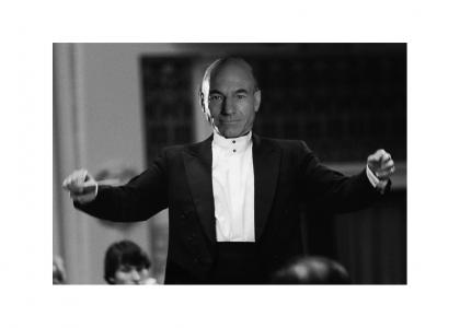 Picard conducts the orchestra (with sheet music)