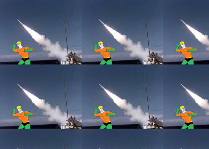 Aquaman trys to stop a missile!