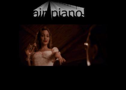 Angelina Jolie plays the Air Piano