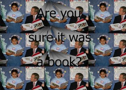 Bush gets caught reading!
