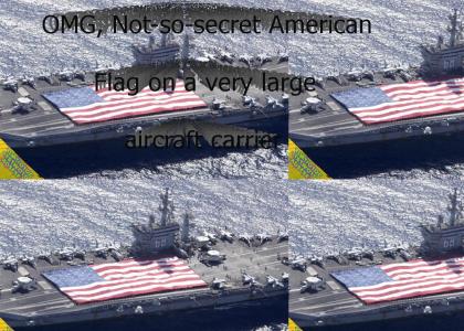 YLMTIOTOCYTSTWOTDADSFSE: OMG, not-so-secret American Flag on a very large Aircraft Carrier
