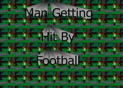 Man getting hit in groin with football