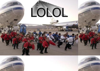 In this YTMND I give you MIDGETS PULLING PLANES (also Poland)