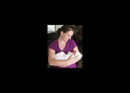 Serita and Greg Holding Shirin