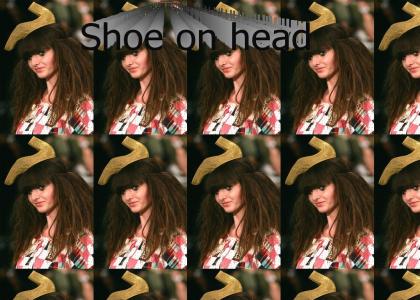 shoe on head