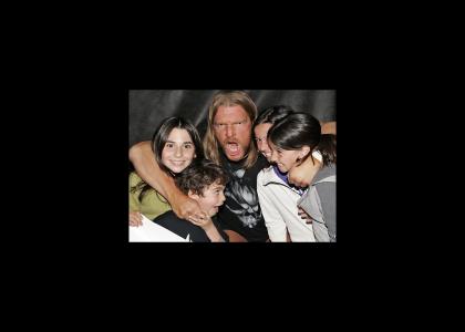 Triple H eats children!