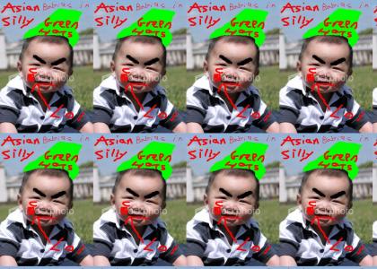 ASIAN BABIES in silly green hats