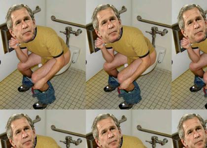George Bush poops