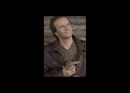 lambert smiles as he holds bunny