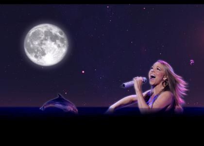 Mariah Carey summons a dolphin