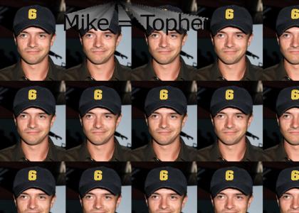 Topher Grace = Mike Glickis