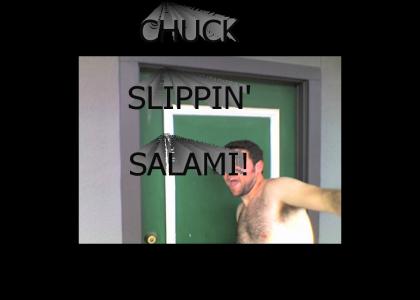 Looks like Chuck's slippin' her the ol' Salami!