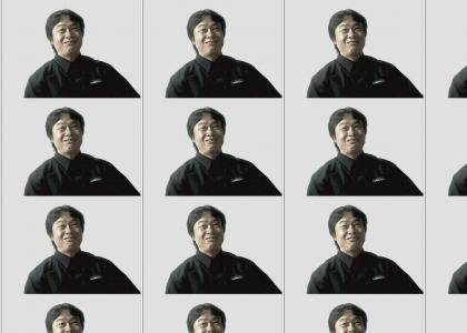 shigeru M. plays with balls