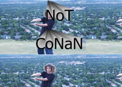 Conan isn't.. A white guy with an afro on top of a mountain!