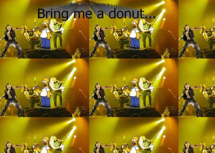 Bruce from Iron Maiden Loves them donuts! (DEW)