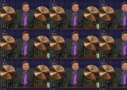 Conan plays cymbals