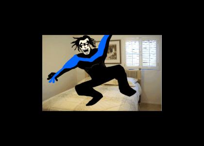 Nightwing Jumping on a Bed