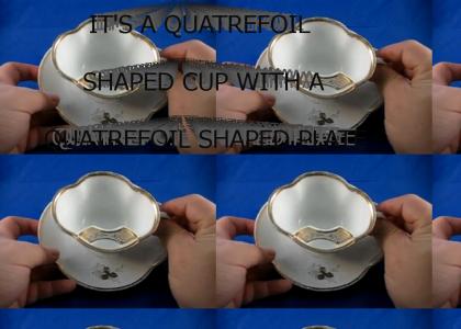 It's a quatrefoil shaped cup with a quatrefoil shaped plate