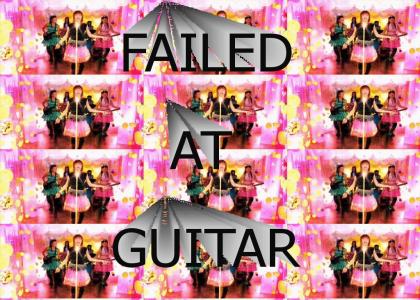 Maki fails at guitar