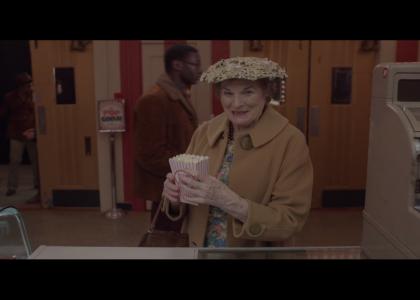 Old lady gets popcorn