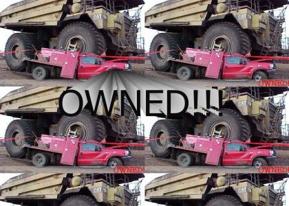 Dump truck crushes pickup