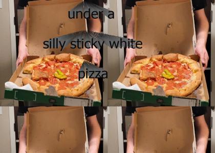 Under a sticky white pizza Under a sticky white pizza